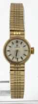 Ladies 9ct gold cased Omega wristwatch, circa 1966. The white dial with baton markers, on an