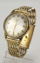 Gents 9ct cased Record De Luxe Automatic wristwatch, hallmarked London 1964. The silvered dial