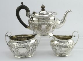 Silver three piece tea set, comprising teapot, sugar bowl & milk jug, hallmarked 'TH, Birmingham