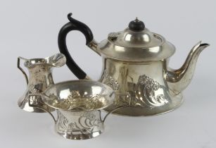 Silver three piece tea set, comprising teapot, sugar bowl & milk jug, hallmarked 'J&C, Birmingham