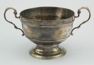 Silver twin handled pedestal bowl, hallmarked 'London 1908', height 8cm, diameter 15cm approx.,