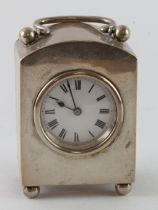 Silver carriage clock, raised on four ball feet, hallmarked 'W.N.G.N., Birmingham 1911', white