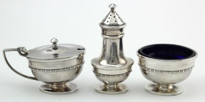 Three piece cruet set comprising mustard pot, salt & pepper pot (+ two blue glass liners) hallmarked