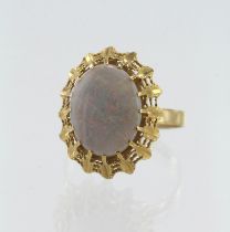 Yellow gold (tests 18ct) opal cocktail ring, opal measures 14mm x 11mm, finger size R, weight 3.9g.