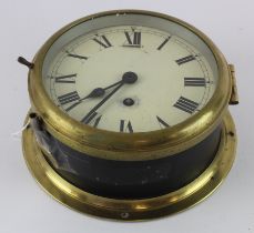 Ships bulkhead clock with Roman numerals to dial, key present, diameter 19.5cm approx. (working at