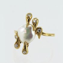 Yellow gold (tests 18ct) contemporary diamond and pearl dress ring, one baroque pearl measuring