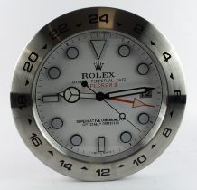 Advertising Wall Clock. Silver 'Rolex' style advertising wall clock (Explorer II) with a white dial,