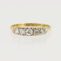 Yellow gold (tests 18ct) vintage diamond ring, five graduating old cuts TDW approx. 0.49ct, carved
