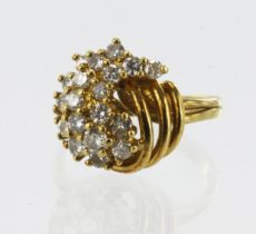 Yellow gold (tests 18ct) diamond cluster ring, nineteen round brilliant cuts TDW approx. 0.58ct,