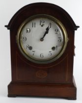 Mahogany mantel clock with inlaid decoration, enamel dial with Arabic numerals, key & pendulum