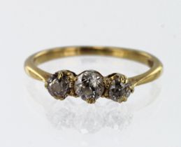 Yellow gold (tests 18ct) diamond trilogy ring, three graduating old cuts TDW approx. 0.60ct,