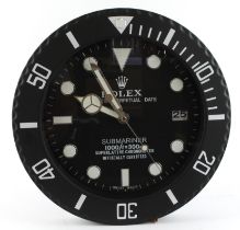 Advertising Wall Clock. Matte black 'Rolex' style advertising wall clock, black dial reads 'Rolex