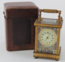 Gilt brass carriage clock with cloisonne decoration, Arabic numerals to dial, height 11cm approx. (