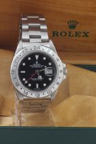 Gents Rolex Oyster Perpetual Date Explorer II stainless steel wristwatch, the black dial on a