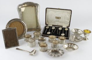 Mixed silver. A collection of various silver, including napkin rings, pin trays, picture frames,