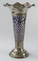 Silver spill vase with blue glass liner, hallmarked 'G&SCoLd, London 1902', height 20cm approx.,