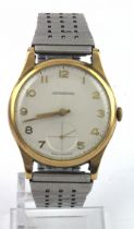 Gents 9ct cased Garrards wristwatch. Hallmarked 1972. The cream dial with arabic numeral and