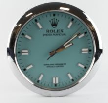 Advertising Wall Clock. Silver 'Rolex' style advertising wall clock, the Tiffany dial reads 'Rolex
