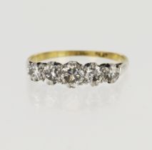 Yellow gold (tests 18ct) diamond dress ring, five graduating diamonds principle approx. 0.37ct,