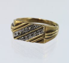 9ct yellow gold signet ring, rectangular table highlighted with diamonds in white gold, table