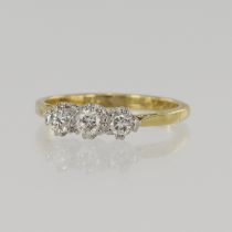 Yellow gold (tests 18ct) diamond trilogy ring, three round brilliant cuts TDW approx. 0.35ct,