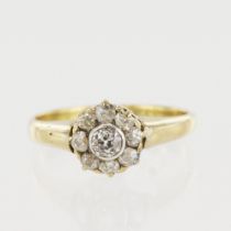 Yellow gold (tests 18ct) diamond cluster ring, principle old cut approx. 0.16ct, surrounded by old