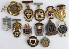 Masonic Jewels & Badges (12) 1940s-60s base metal. Plus a 19th century gold-plated mourning brooch