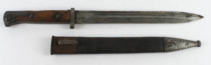 German WW1 model 1894/98 knife bayonet in its leather steel mounted scabbard.