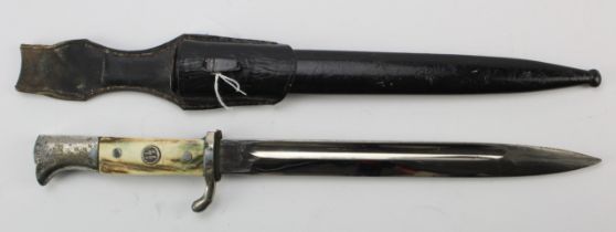 German 3rd Reich K98 bayonet with late war plating and has been personalised with horn grips and '