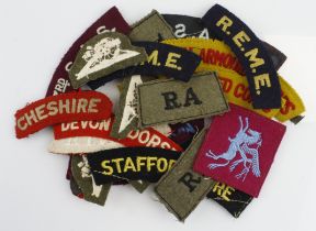 Badge collection of various WW2 cloth shoulder titles, div patches etc.