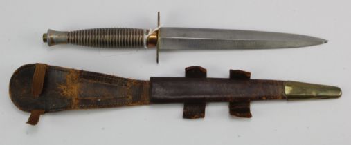 Commando dagger, with leather scabbard a/f, only visible mark is a '1' to the grip top