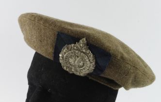 Argyle and Sutherland Highlanders slouch hat, with cap badge and tartan backing. Stamped inside '