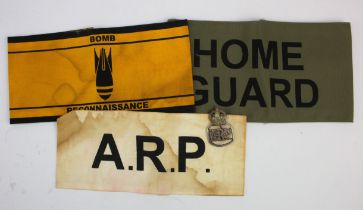 ARP an unusual Air Raid Precations badge and 3 later made armbands.