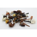 Pipes. A colection of over twenty various smoking pipes, including clay, meerschaum, etc.