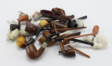 Pipes. A colection of over twenty various smoking pipes, including clay, meerschaum, etc.