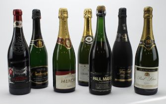 Champagne. A group of seven unopened bottles (mostly Champagne), including Mercier, Paul Letrier,