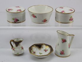 Royal Crown Derby / Staffordshire. A group of miniature jugs, plates, dishes etc. by Royal Crown
