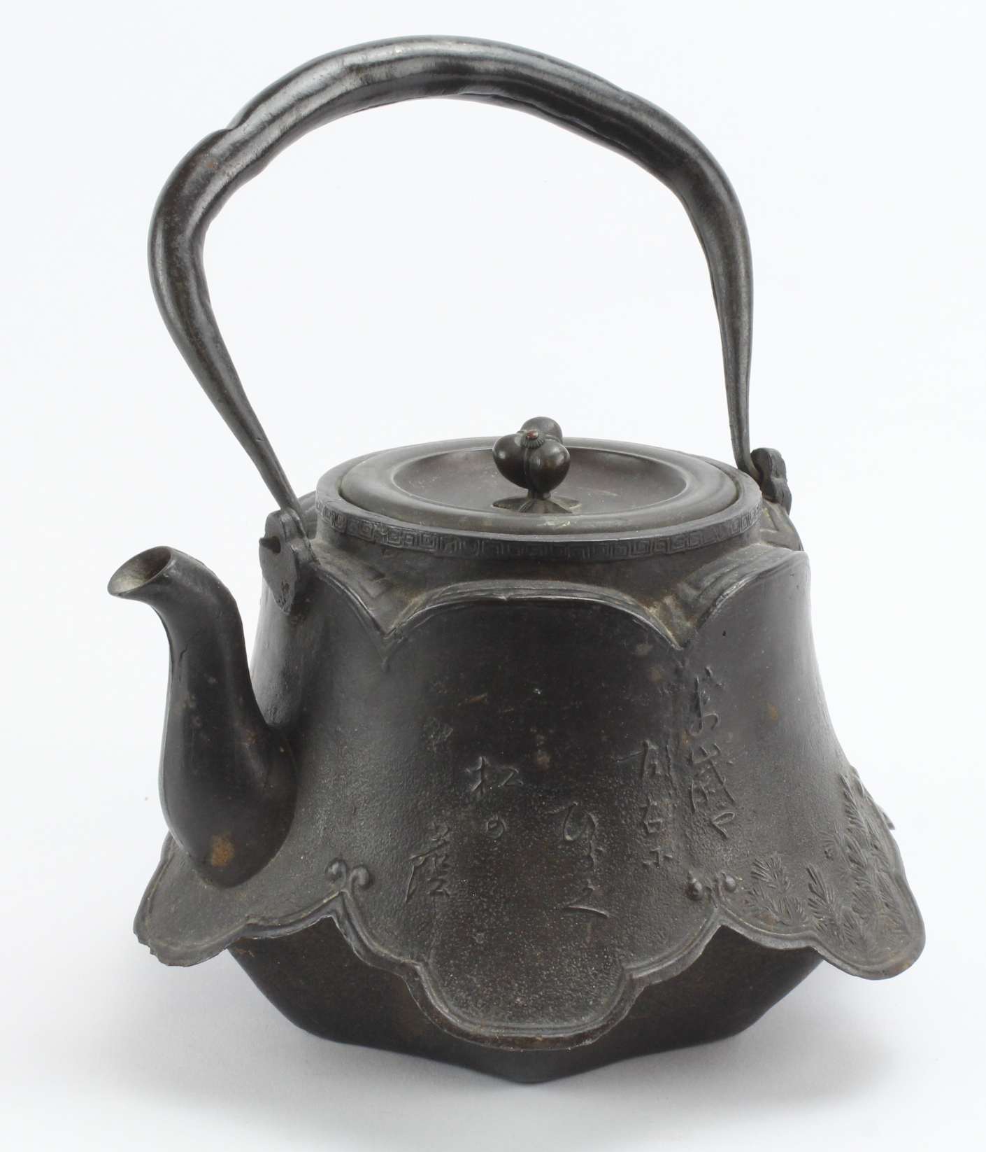 Japanese Tetsubin cast iron kettle, with figural decoration to side, marks to base and to inside