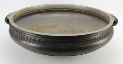 Urli. Large Indian bronze Urli (Temple cooking bowl), circa 18th - 19th Century, with twin scrolling