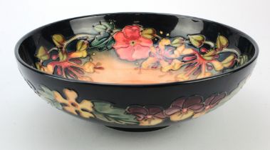 Moorcroft. A large Moorcroft 'Oberon' pattern bowl, makers impressed marks and signed to base 'J.