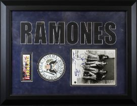 Ramones. A signed black & white photograph of all four members of the Ramones, comprising Joey
