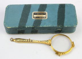 Gilt metal lorgnette glasses, with gilt decoration to handle, length