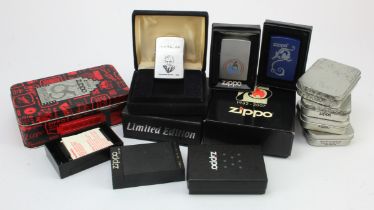 Zippo Lighters. A collection of thirteen Zippo lighters, each relating to the Zippo company, all