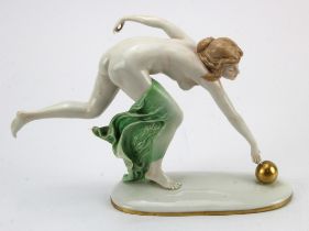 Art Nouveau female nude figure reaching for a gold boule whilst her green towel falls, possibly