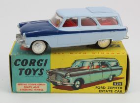 Corgi Toys, no. 424 'Ford Zephyr Estate Car' (two tone blue with white wall tyres), contained in