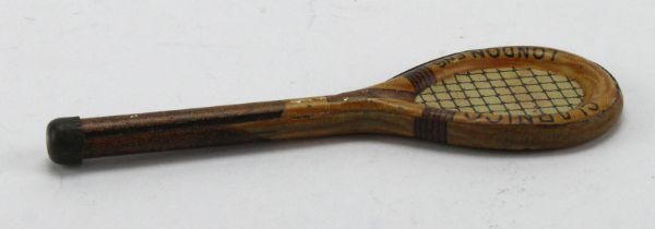 Novelty tin in the form of a tennis racket 'Clarnico, London, Eng.', length 11cm approx.