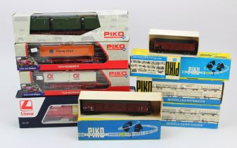 Piko. Nine boxed mostly Piko OO gauge wagons (one Lima), including 57700, 57720, 95498, 5/152-01,