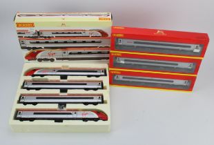 Hornby. A Hornby boxed OO gauge 'Virgin Trains Pendolino train pack' (R2467)', together with three