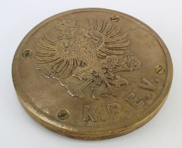 Prussian metal & wood railway plaque, bearing the Prussian coat of arms 'K.P.E.V.', diameter 24.