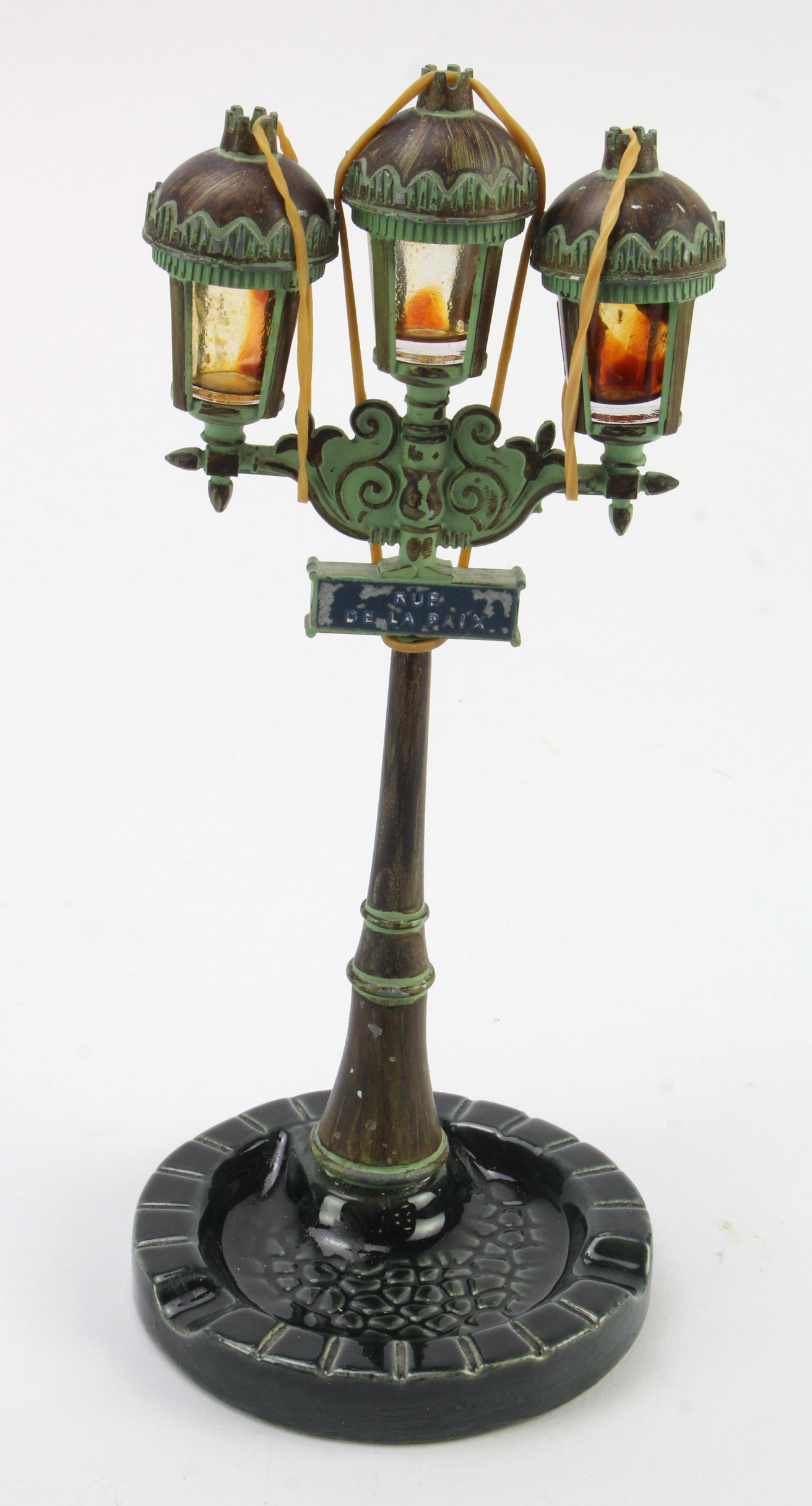 Corday scent bottle holder & combined ashtray, circa 1960s depicting street lamp with three